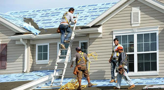 Roofers: Indispensable Construction Craftsmen